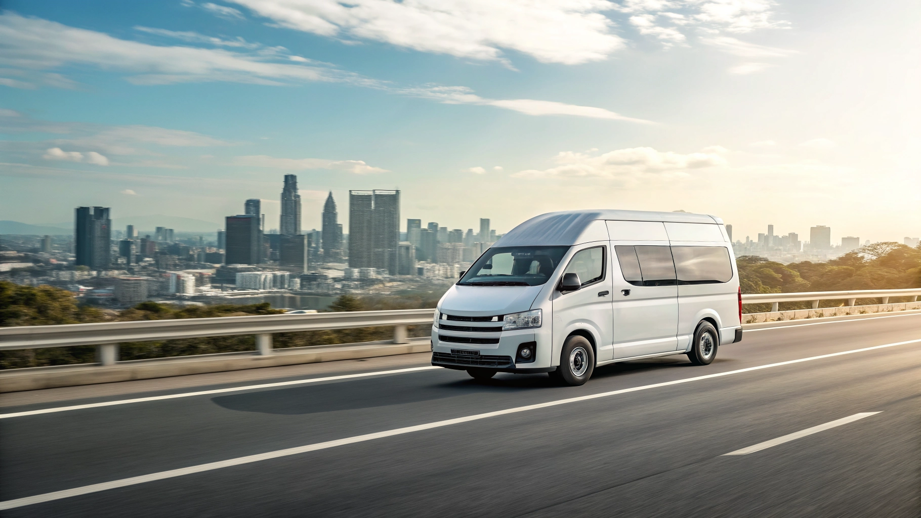 Mobil travel modern di jalan raya dengan latar belakang pemandangan kota Bandung yang cerah.